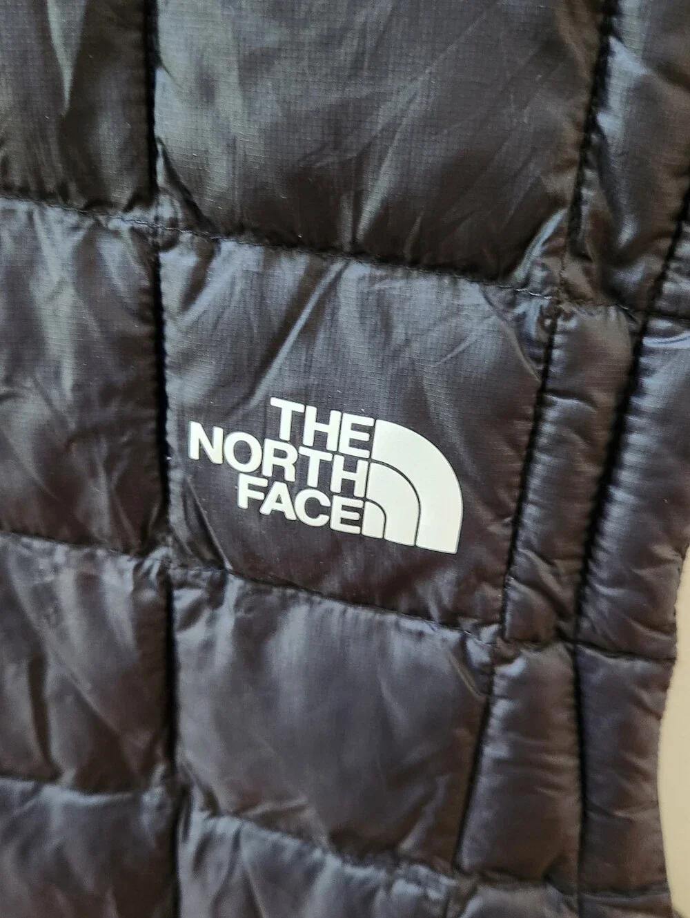 The North Face black puffer vest Men's XL